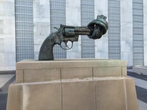 Sculpture of a gun with the barrel twisted in a knot